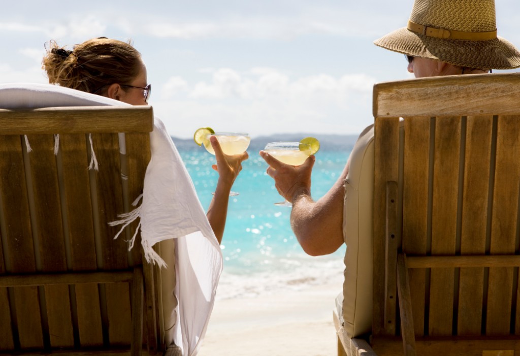 couple drinking on the beach