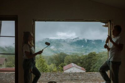 couple renovating a house with a great view